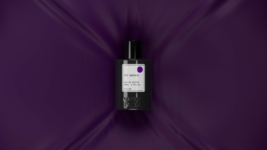 Creative perfume product photography perfume bottle falling on the purple fabric