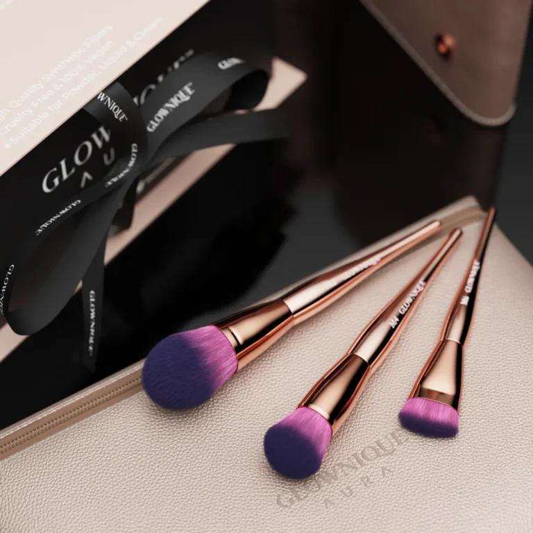 An assortment of glow beauty brushes arranged artistically, highlighting their unique colors and luxurious appearance for makeup enthusiasts